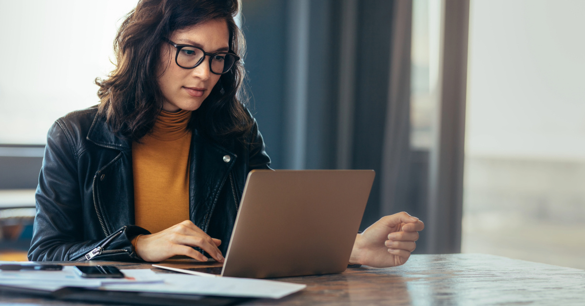 Business woman busy working on laptop computer at office 